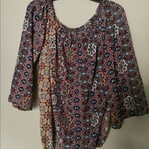 Find your hippie self. Loose off shoulder blouse